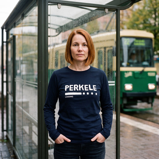 Perkele loading long sleeve tee in navy, worn by Sanna at a Helsinki tram stop, Very Finnish Problems