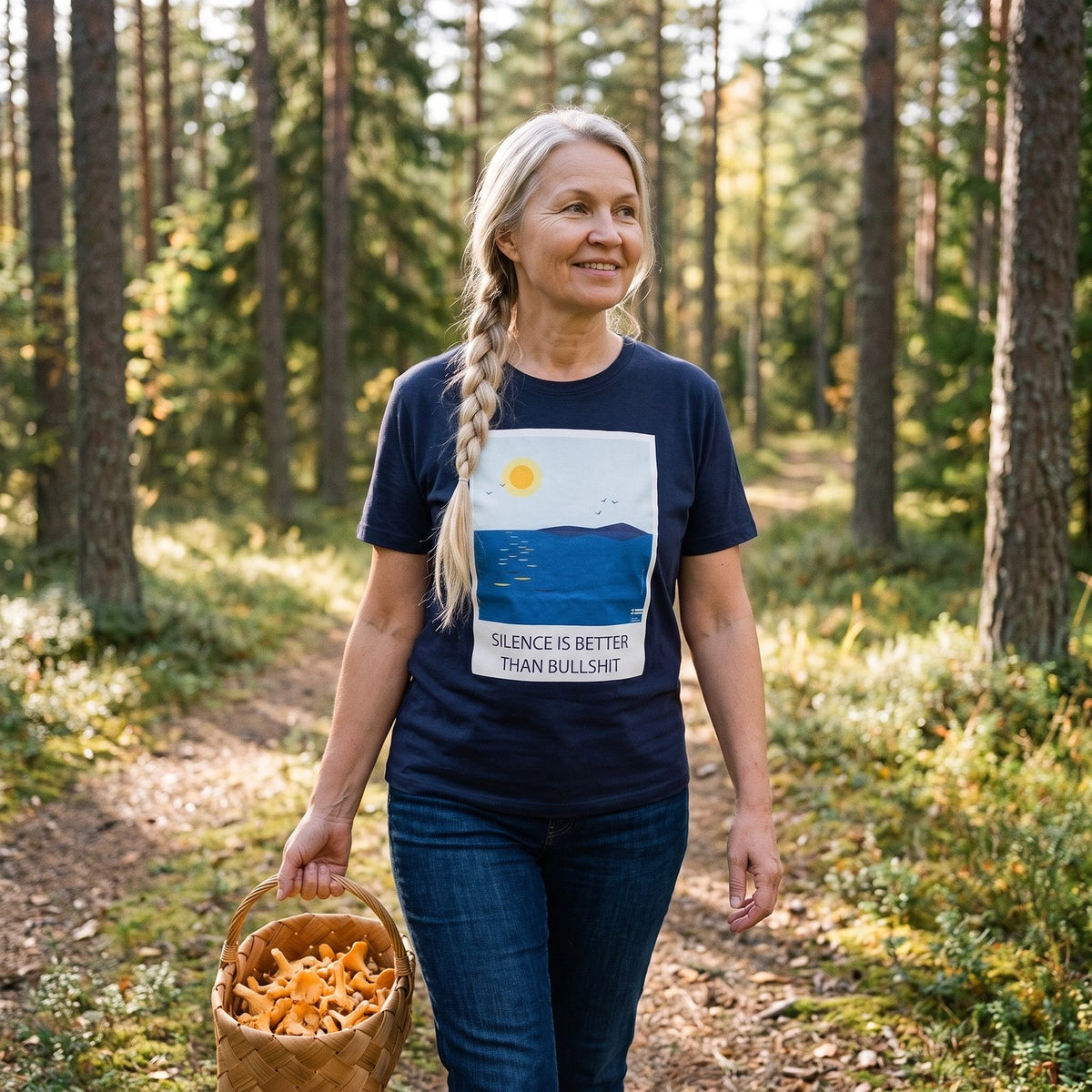 Silence Beats Bullshit t-shirt in navy, worn by Anneli on a pine forest path, Very Finnish Problems