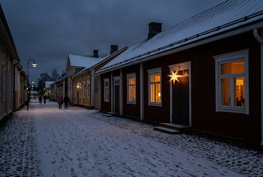 Finnish Christmas traditions — a snowy Nordic street with star lantern and warm amber light