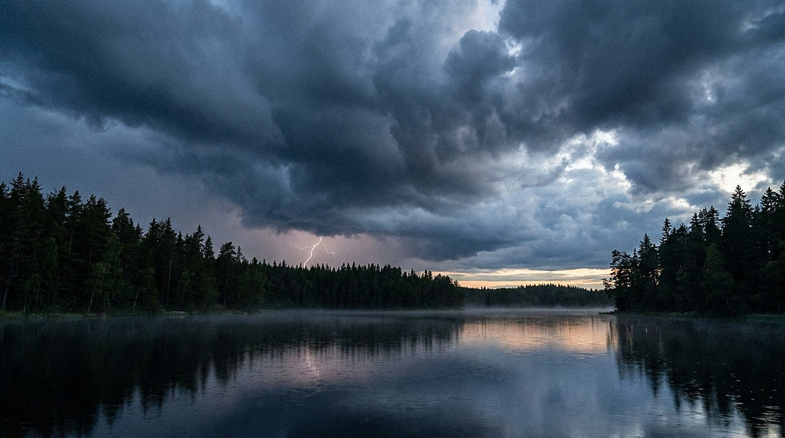 Dark thunderstorm clouds over a Finnish forest lake at dusk, Very Finnish Problems
