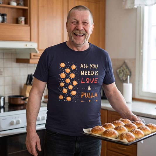All You Need Is Love & Pulla t-shirt in navy, worn by Juha carrying a tray of fresh pulla, Very Finnish Problems