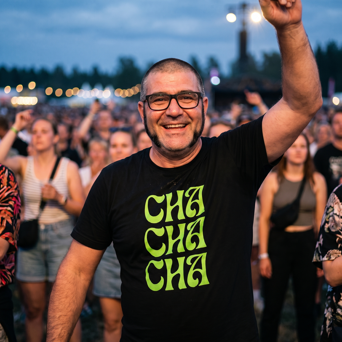 Cha Cha Cha t-shirt in black, worn by Jaska dancing at a summer festival, Very Finnish Problems