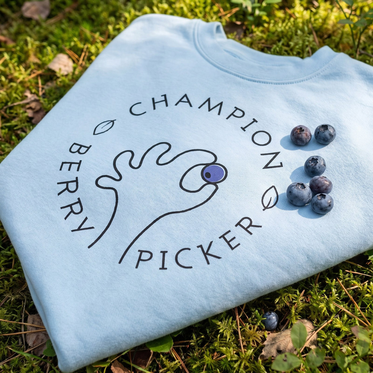 Champion Blueberry Picker sweatshirt print close up on light blue fleece, Very Finnish Problems