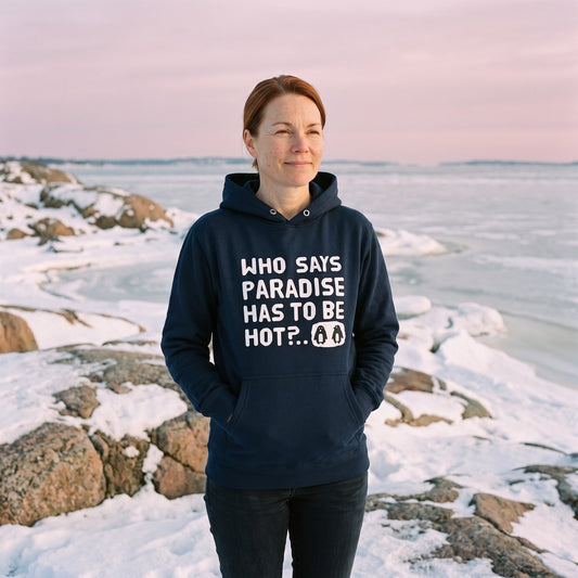 Cold paradise Finnish Nature Hoodie in navy blazer, worn by Sanna on a frozen archipelago shore at sunset, Very Finnish Problems