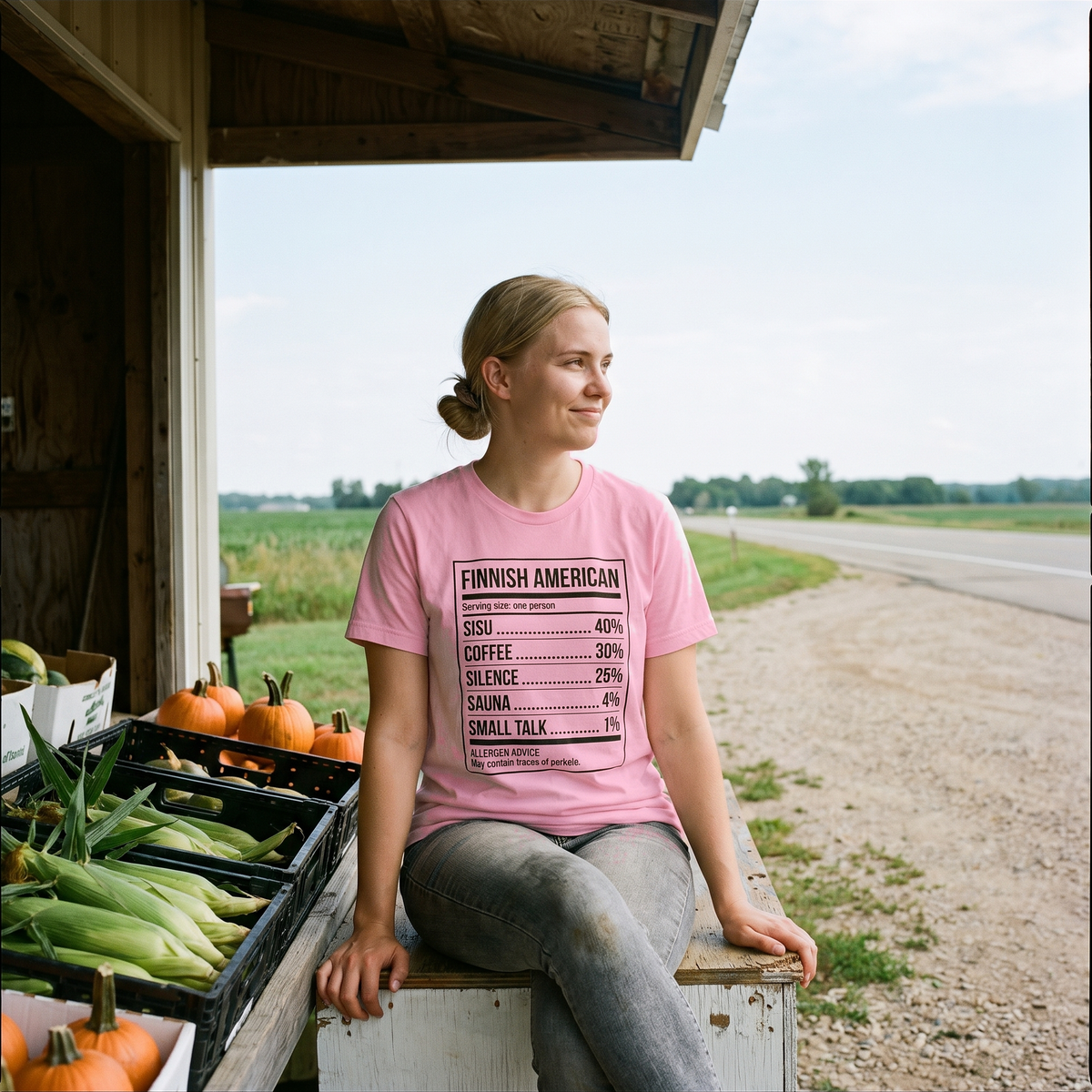 Finnish American Ingredients t-shirt in pink, worn by a young woman at a roadside produce stand, Very Finnish Problems