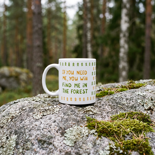 Forest Person mug in white, on a lichen-covered granite boulder in a Finnish forest, Very Finnish Problems