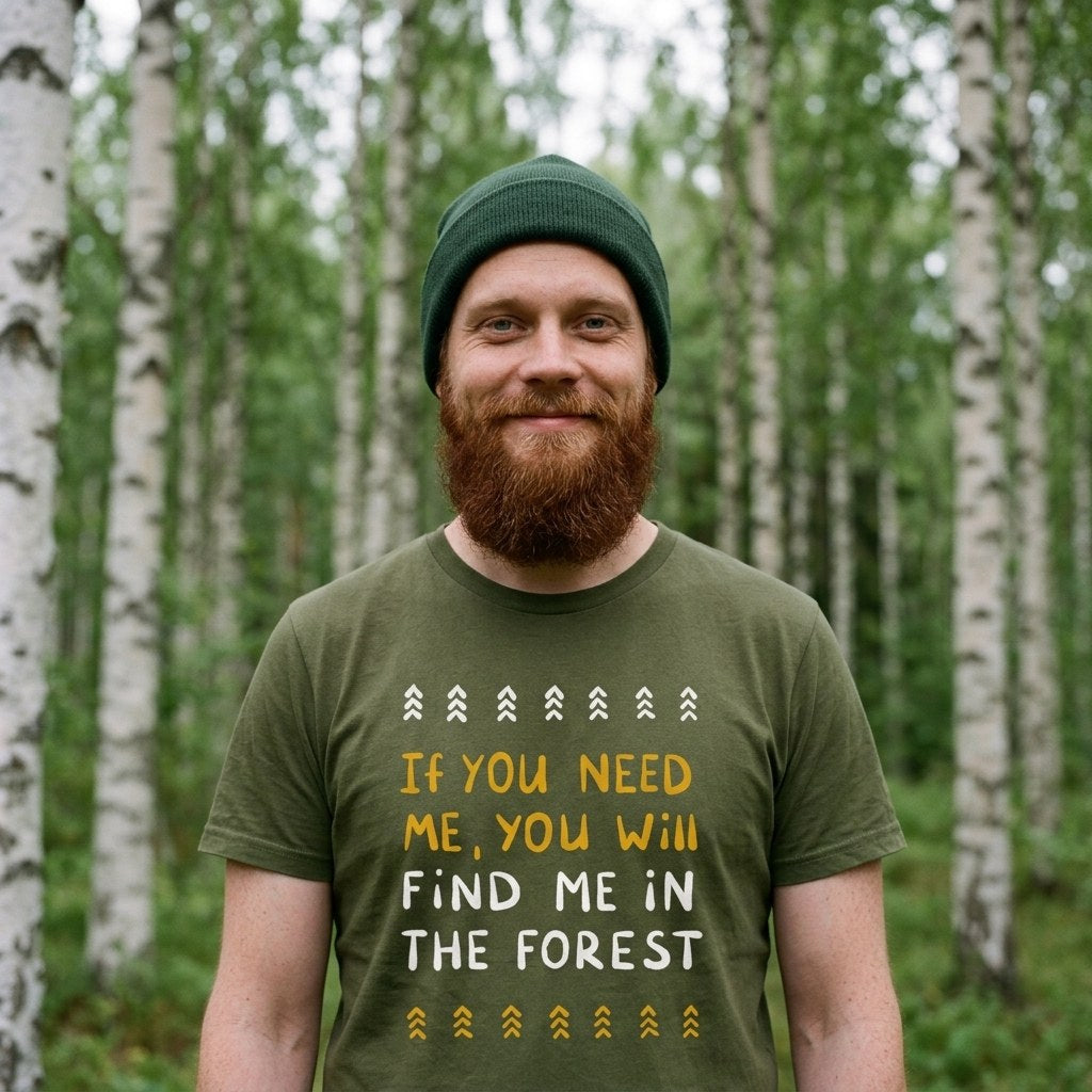Man in birch forest wearing olive green Forest Person t-shirt