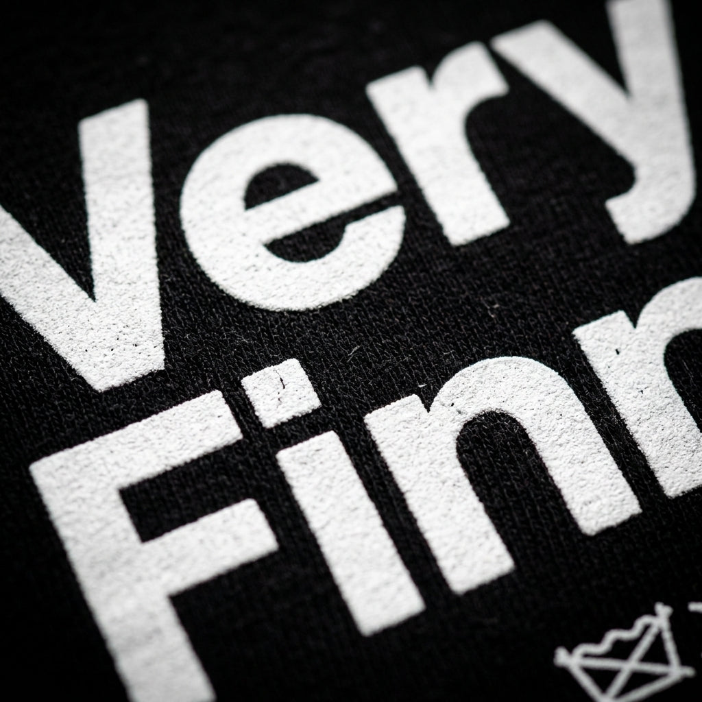 Close-up print detail of Very Finnish Service Manual t-shirt