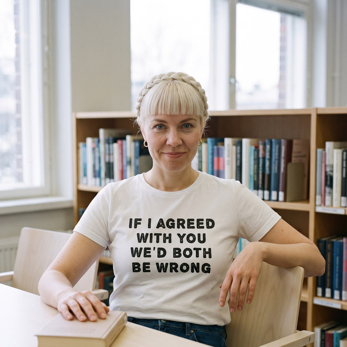 If I agreed with you organic t-shirt in white, worn by Venla at a reading table in a Finnish library, Very Finnish Problems
