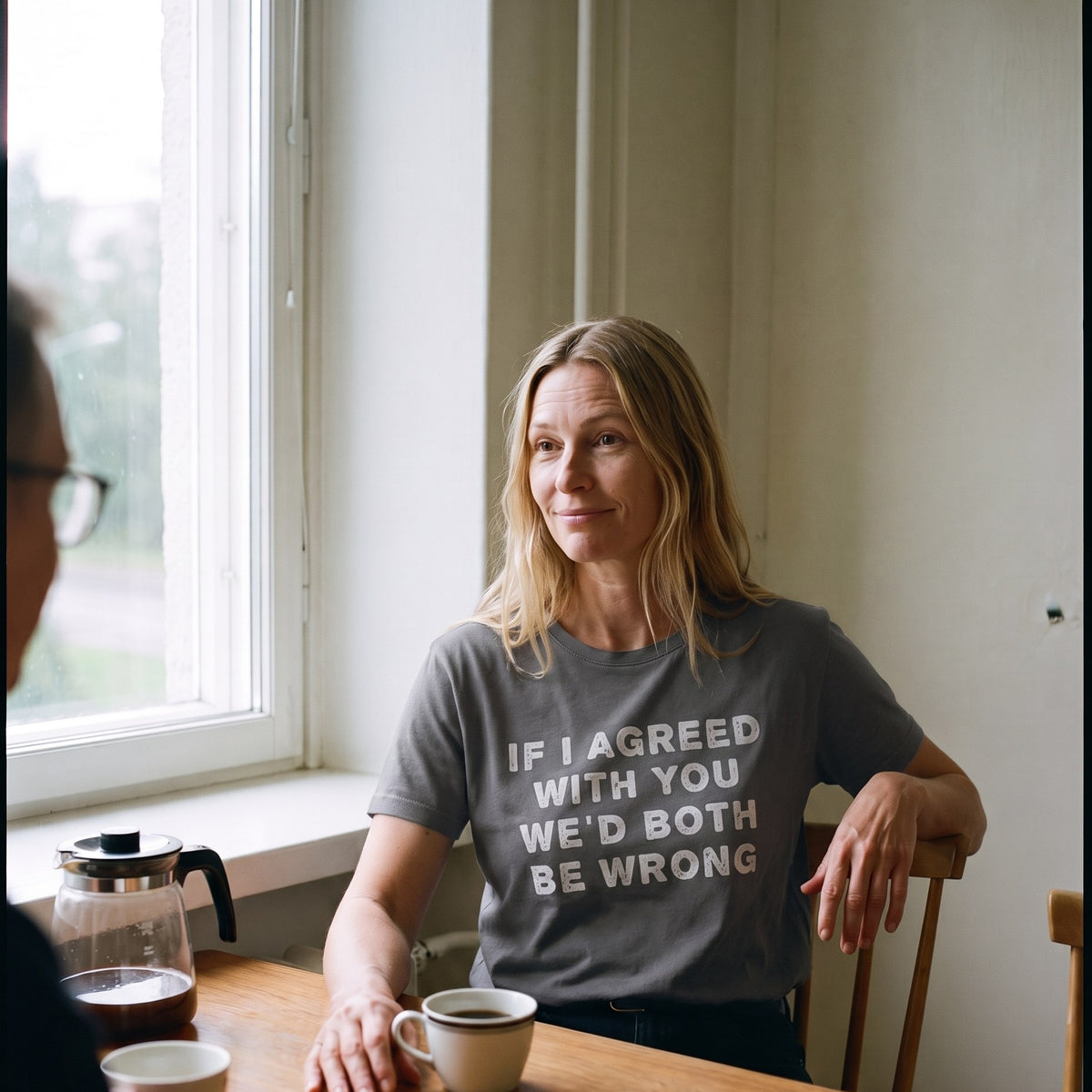 If I agreed with you t-shirt in asphalt grey, worn by Elina at a Finnish kitchen table with coffee, Very Finnish Problems