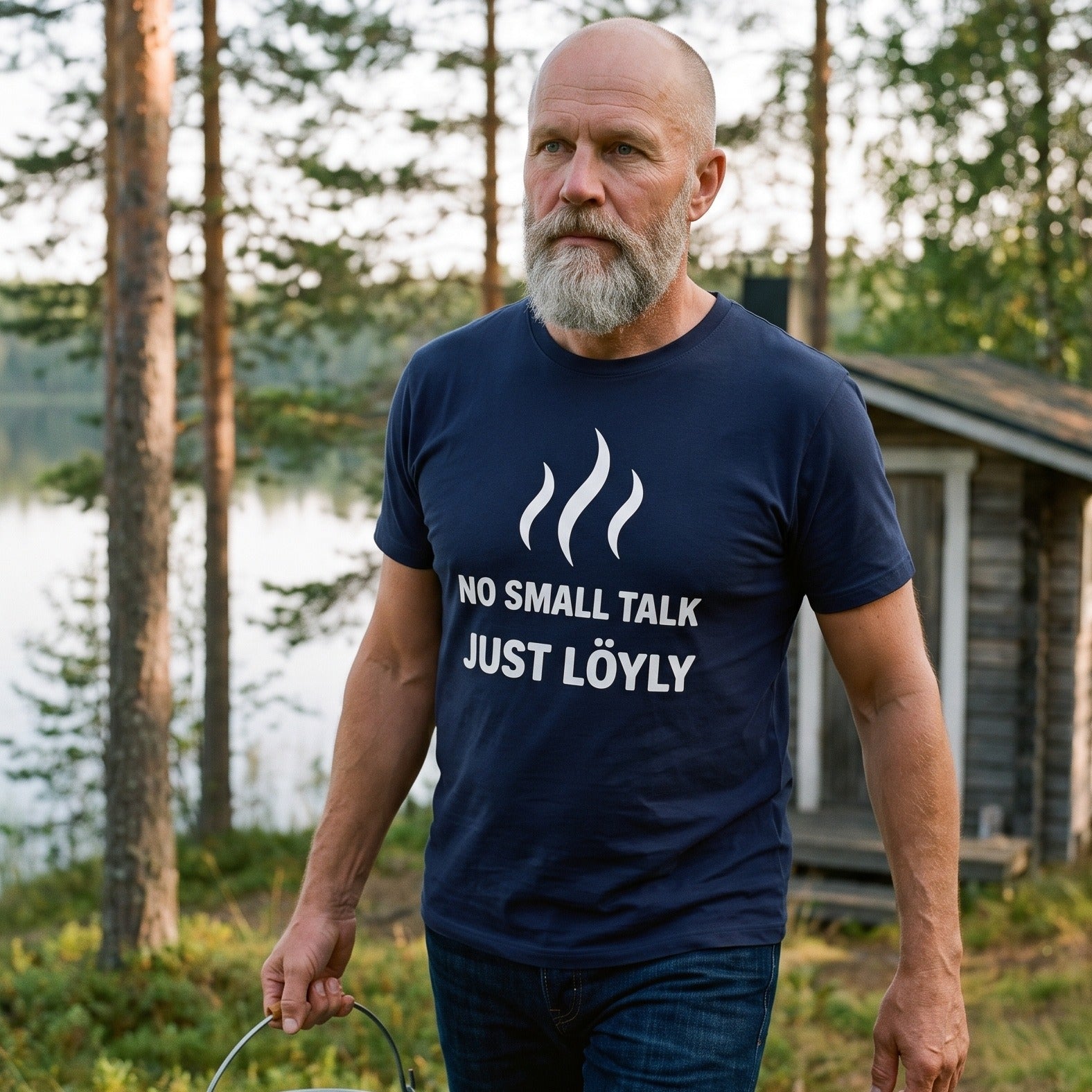 No Small Talk Just Löyly t-shirt in navy, worn by a man carrying a bucket of lake water up to the sauna, Very Finnish Problems