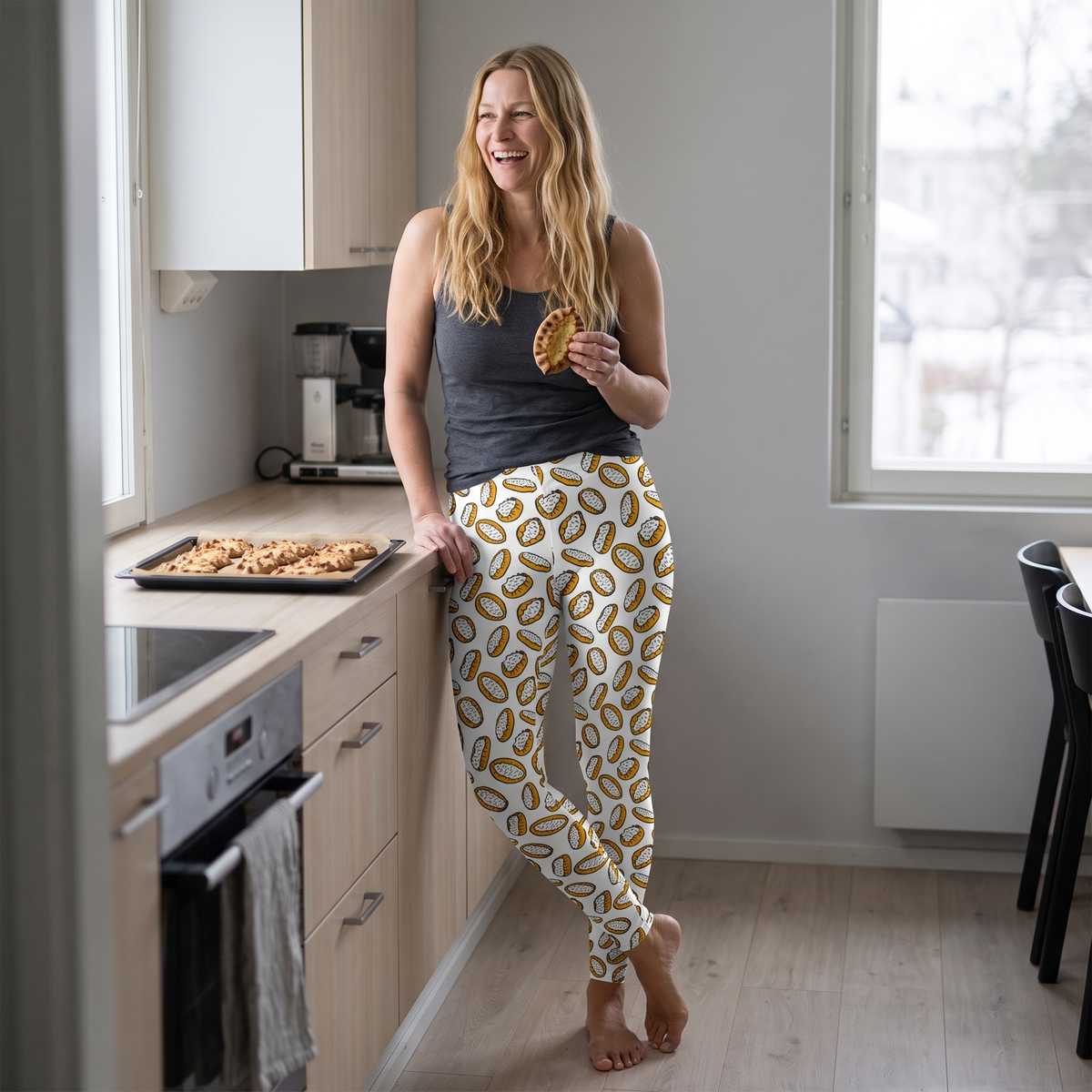 Karelian pies Finnish food leggings, worn by Elina in a kitchen with a tray of pies, Very Finnish Problems