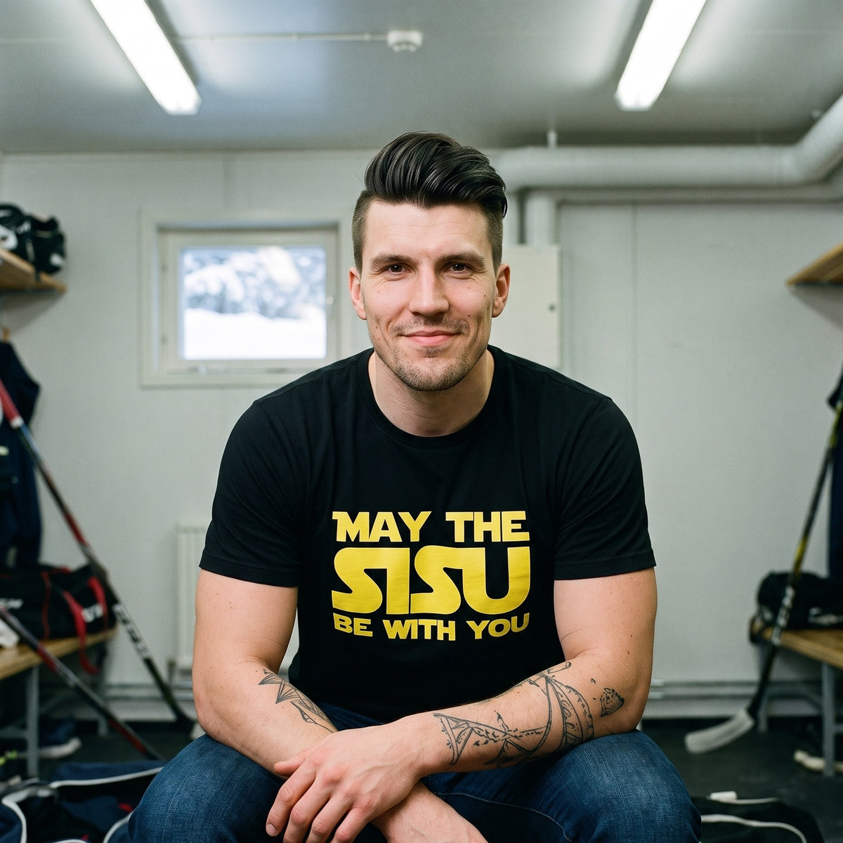 May the Sisu Be With You t-shirt in black, worn by Eetu on the bench in a Finnish ice hall changing room after a game, Very Finnish Problems