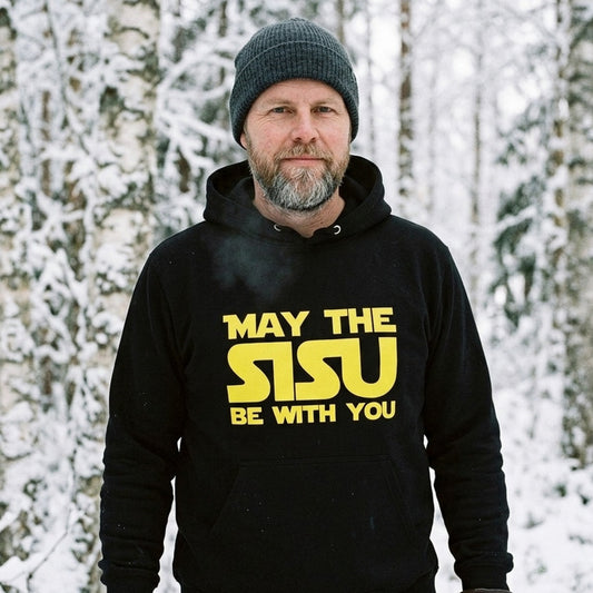 Man in snowy Finnish forest wearing black May the Sisu hoodie, Very Finnish Problems