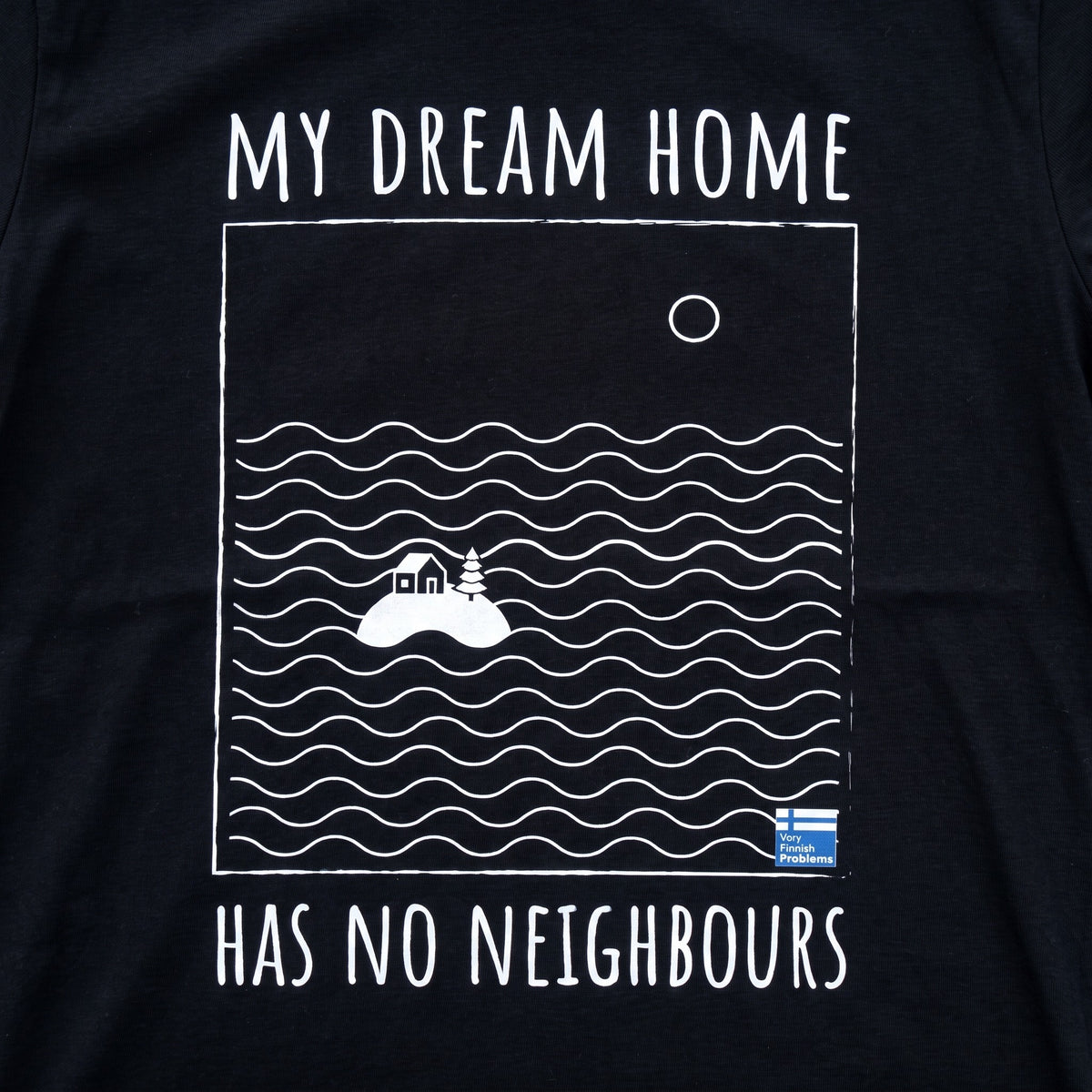 Close-up of the No Neighbours print, my dream home has no neighbours, white ink on a black t-shirt, Very Finnish Problems
