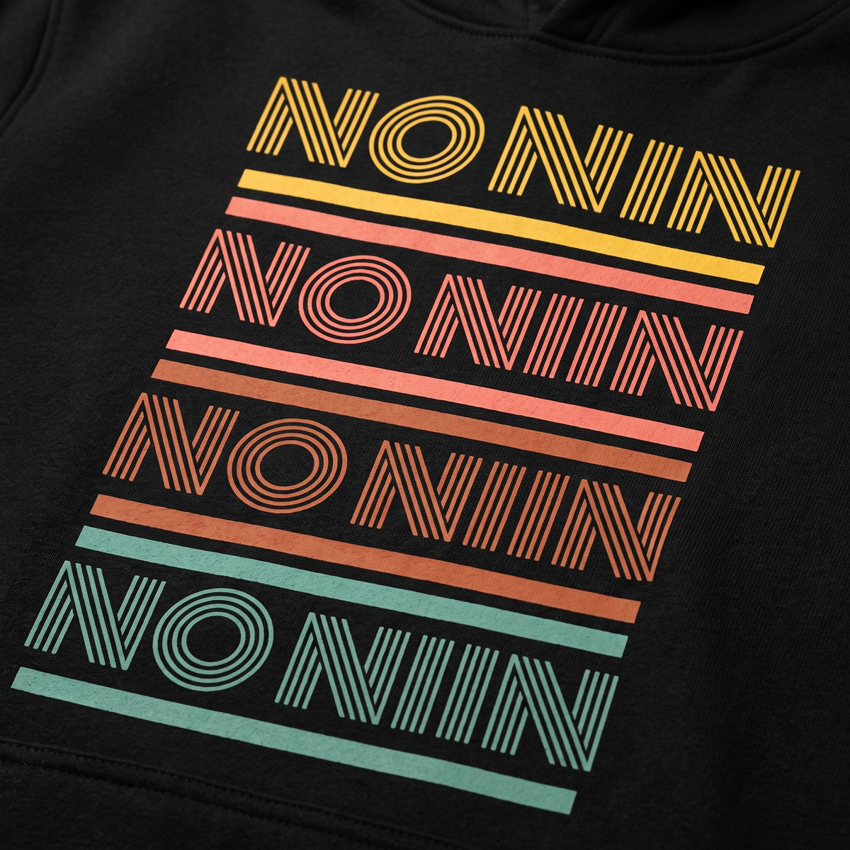 Close-up of the No niin retro print on black hoodie fleece, Very Finnish Problems