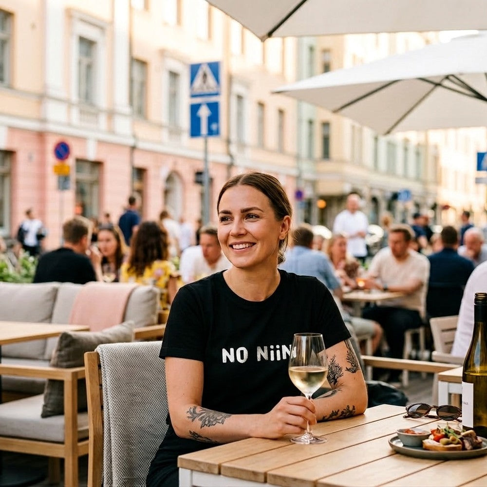 No niin Finnish language t-shirt worn at a Helsinki cafe terrace, Very Finnish Problems