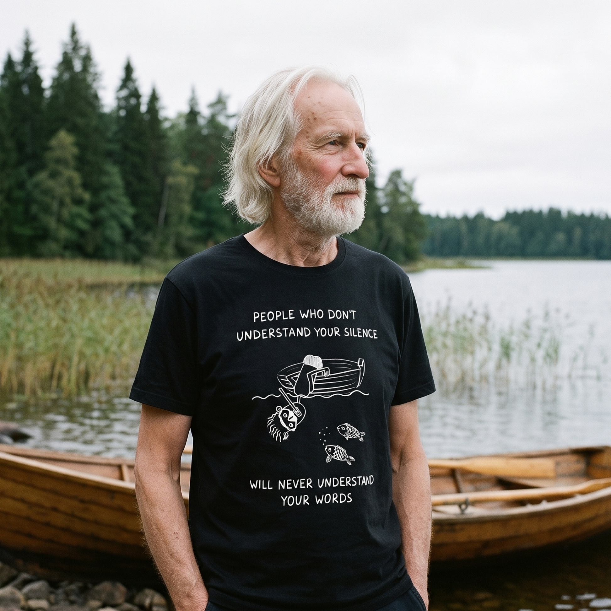 People Who Don't Understand Your Silence t-shirt in black, worn by a man on a Finnish lake shore, Very Finnish Problems