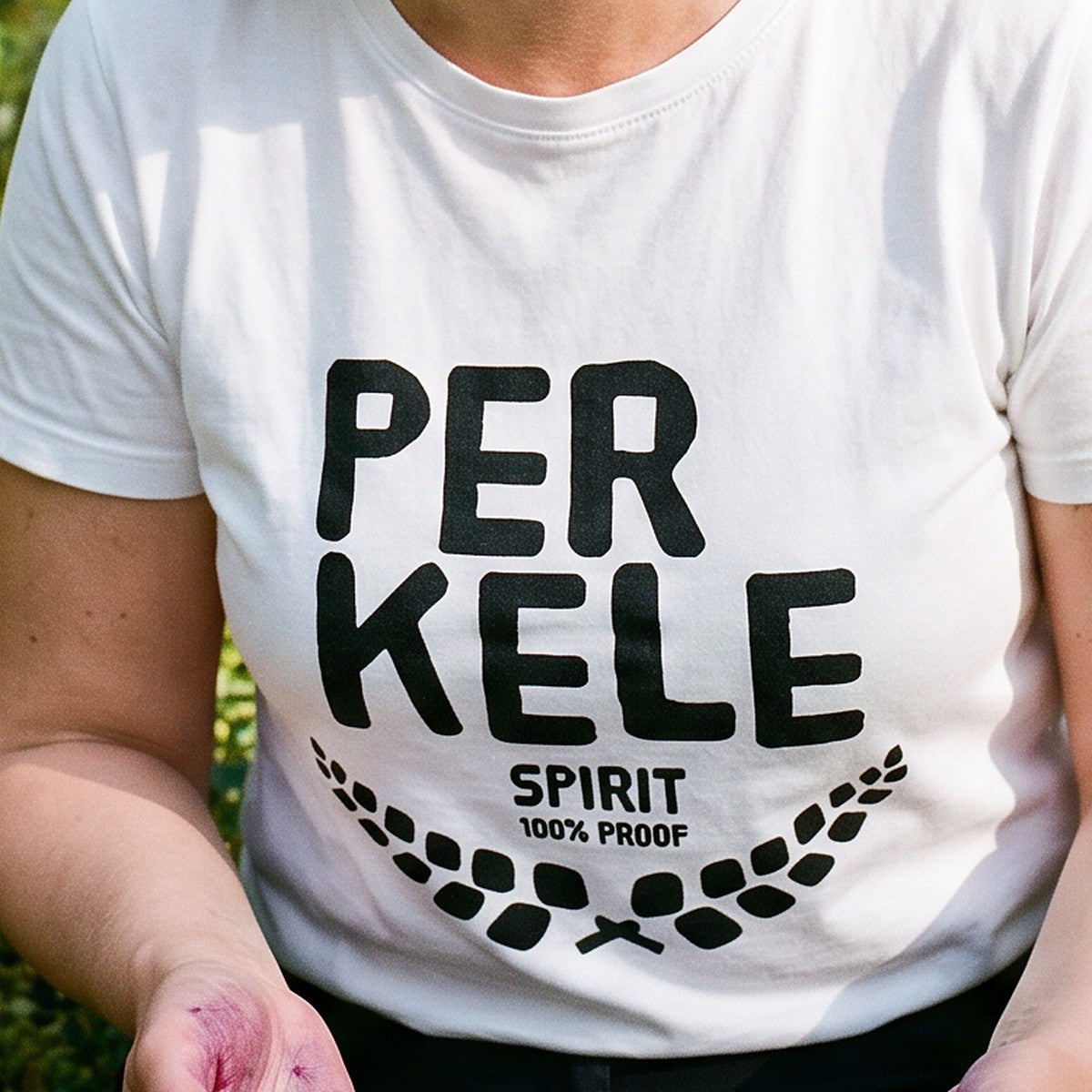 Close-up of the print on the white Perkele 100% Proof organic t-shirt, Very Finnish Problems