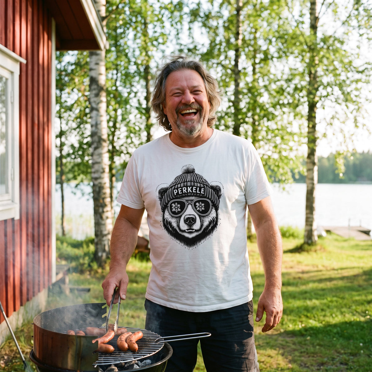Perkele Bear t-shirt in white, worn by Jojelli grilling sausages at a summer cottage, Very Finnish Problems