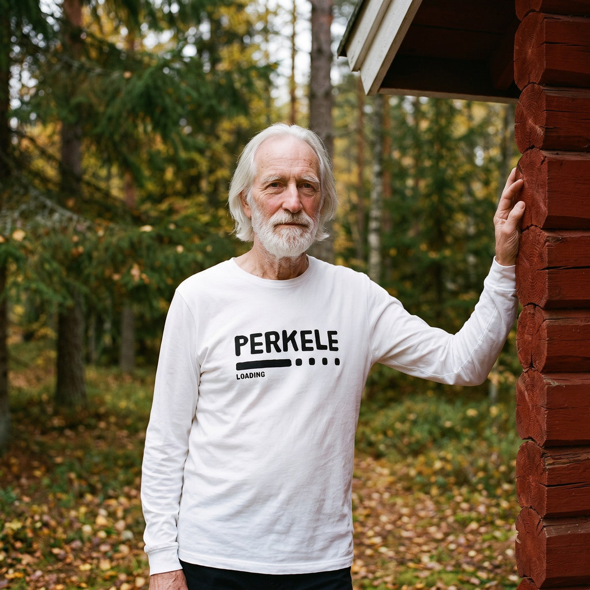 Perkele loading long sleeve tee in white, worn by Pertti outside a red forest cabin, Very Finnish Problems