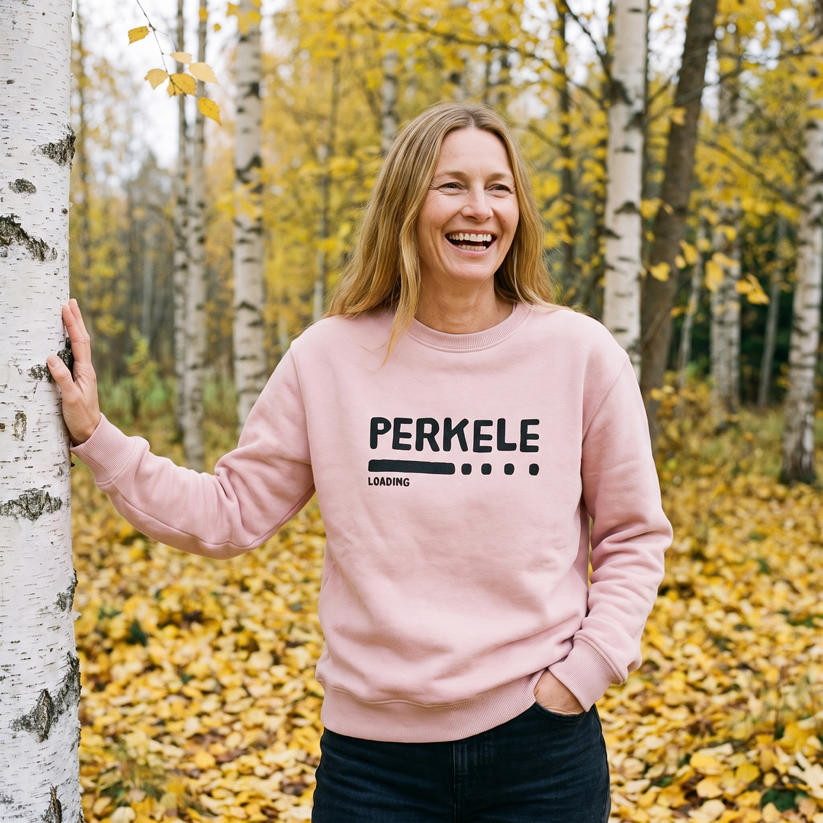 Perkele loading Finnish language sweatshirt in light pink, worn by Elina among autumn birches, Very Finnish Problems