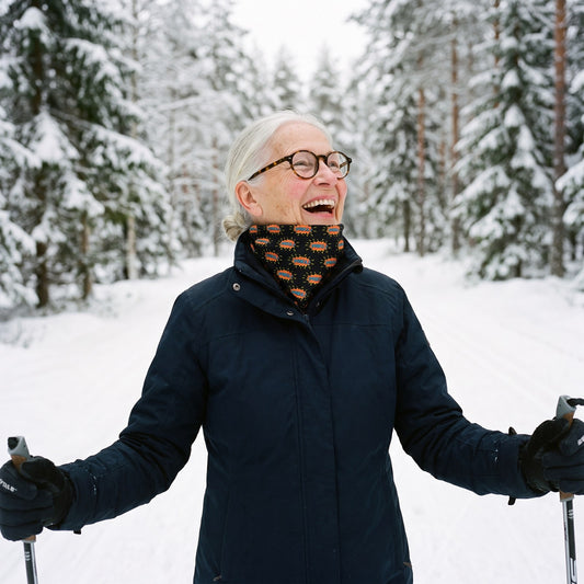 PRKL Bang neck gaiter, worn by Raija on a cross-country ski trail, Very Finnish Problems