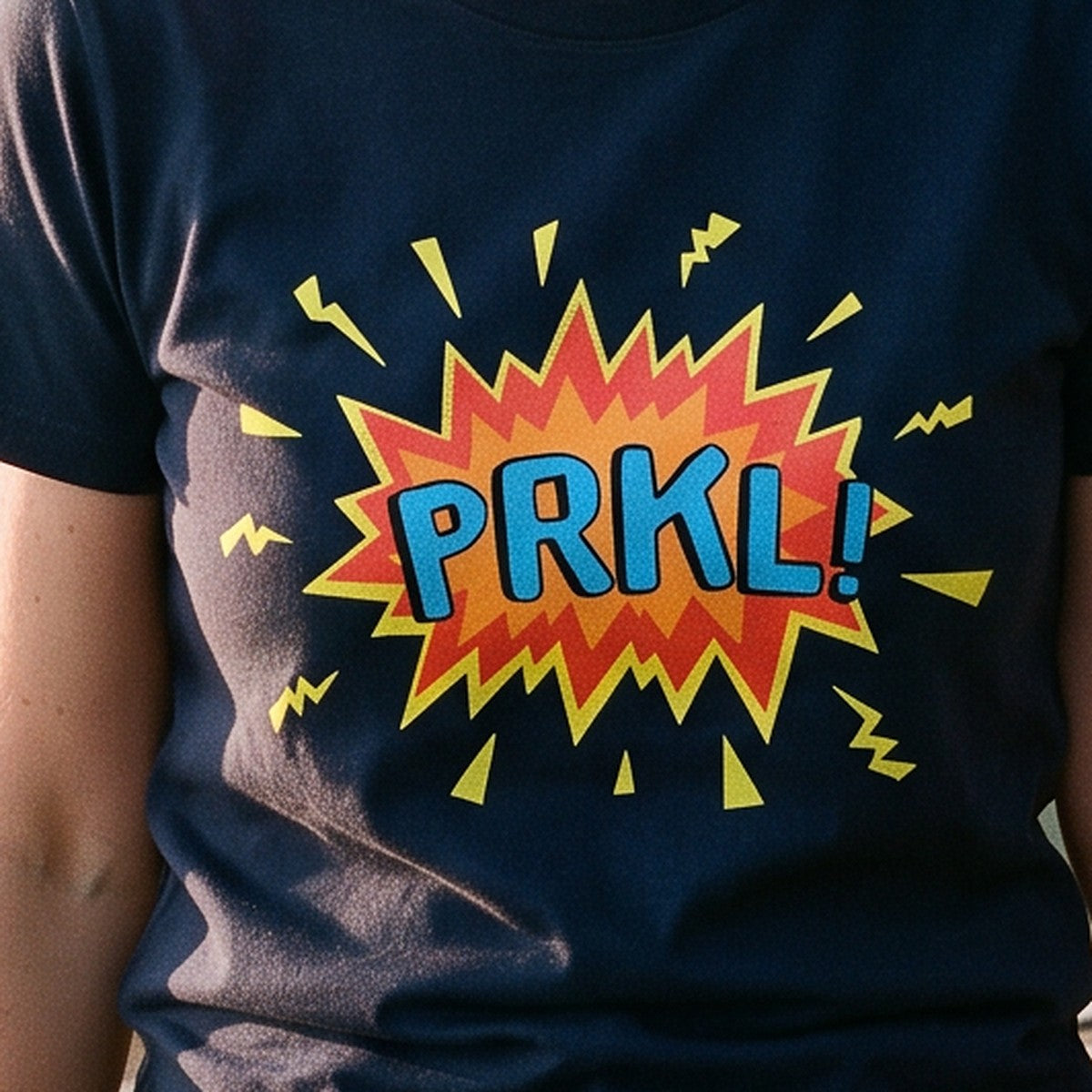 Close-up of the print on the french navy PRKL Bang organic t-shirt, Very Finnish Problems