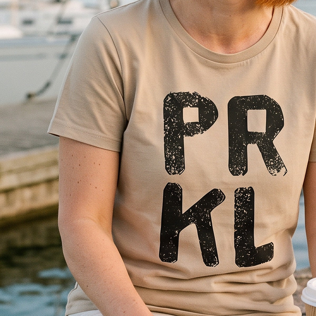 Close-up of the print on the desert dust PRKL organic t-shirt, Very Finnish Problems
