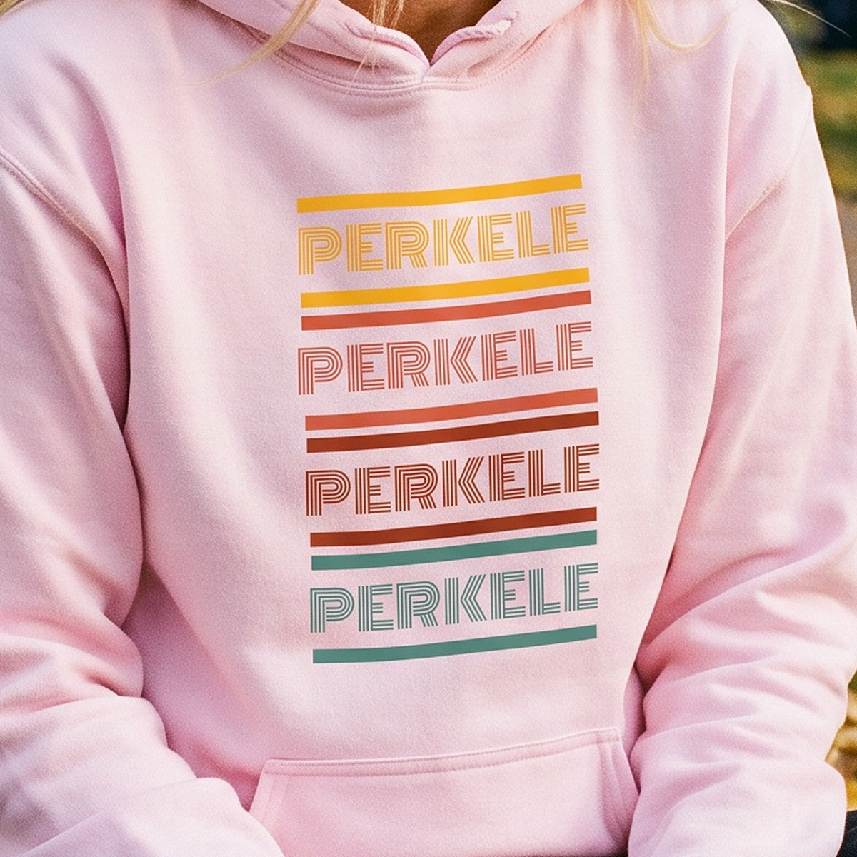 Close-up of the print on the light pink Retro Perkele hoodie, Very Finnish Problems