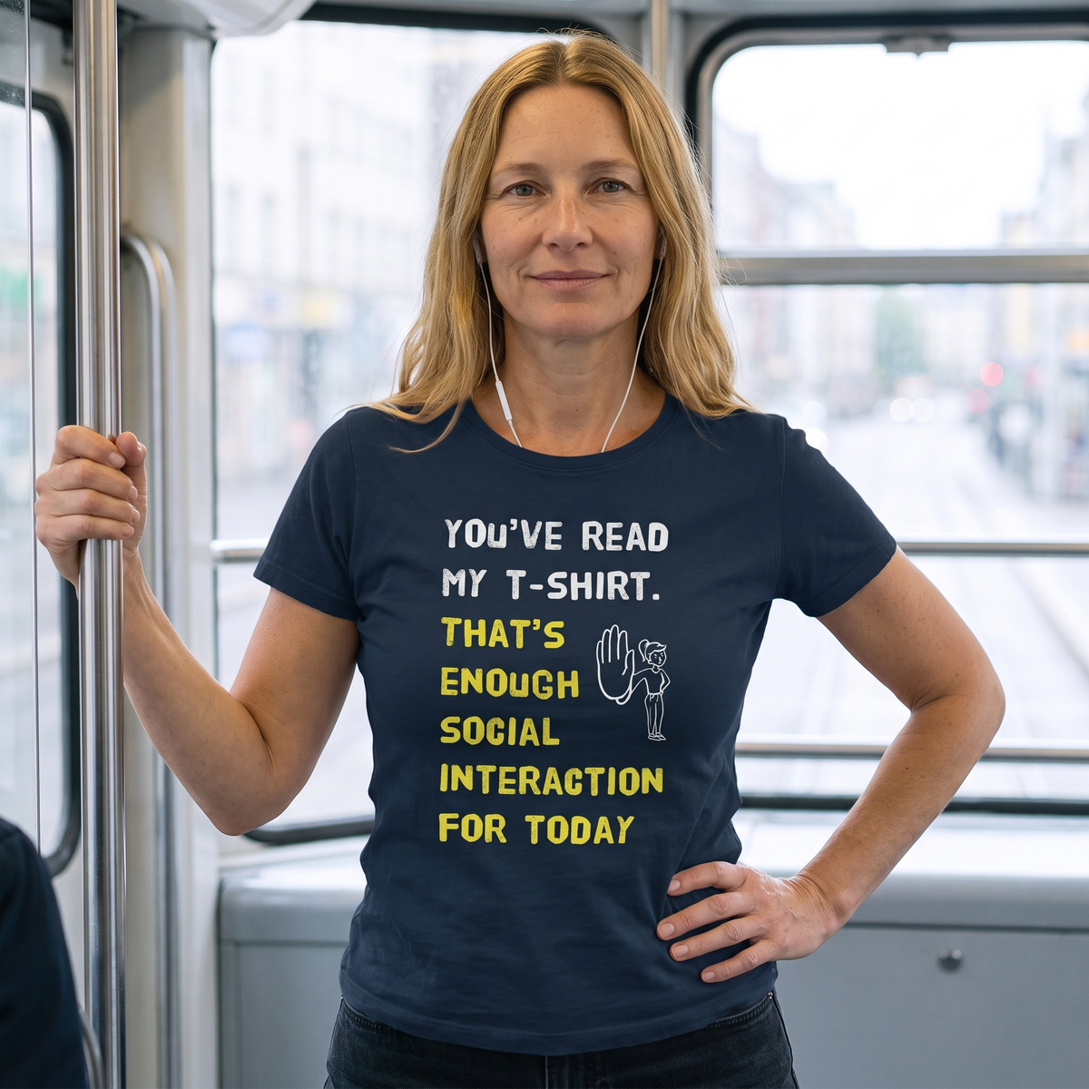 Social Interaction girl Finnish introvert t-shirt in navy, worn by Elina standing on a tram, Very Finnish Problems