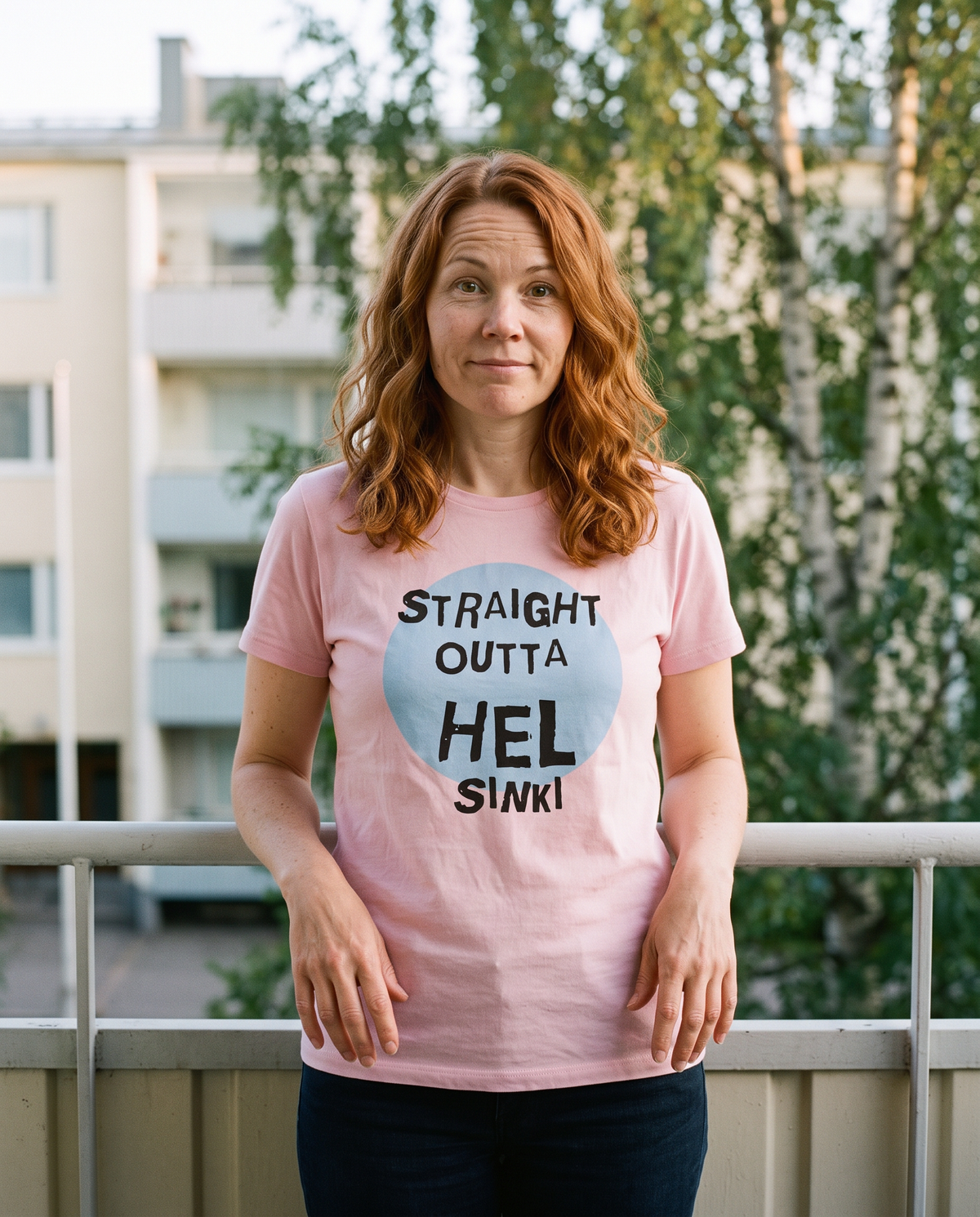 Straight Outta Hel II t-shirt in pink, worn by Sanna on a Finnish apartment balcony, Very Finnish Problems
