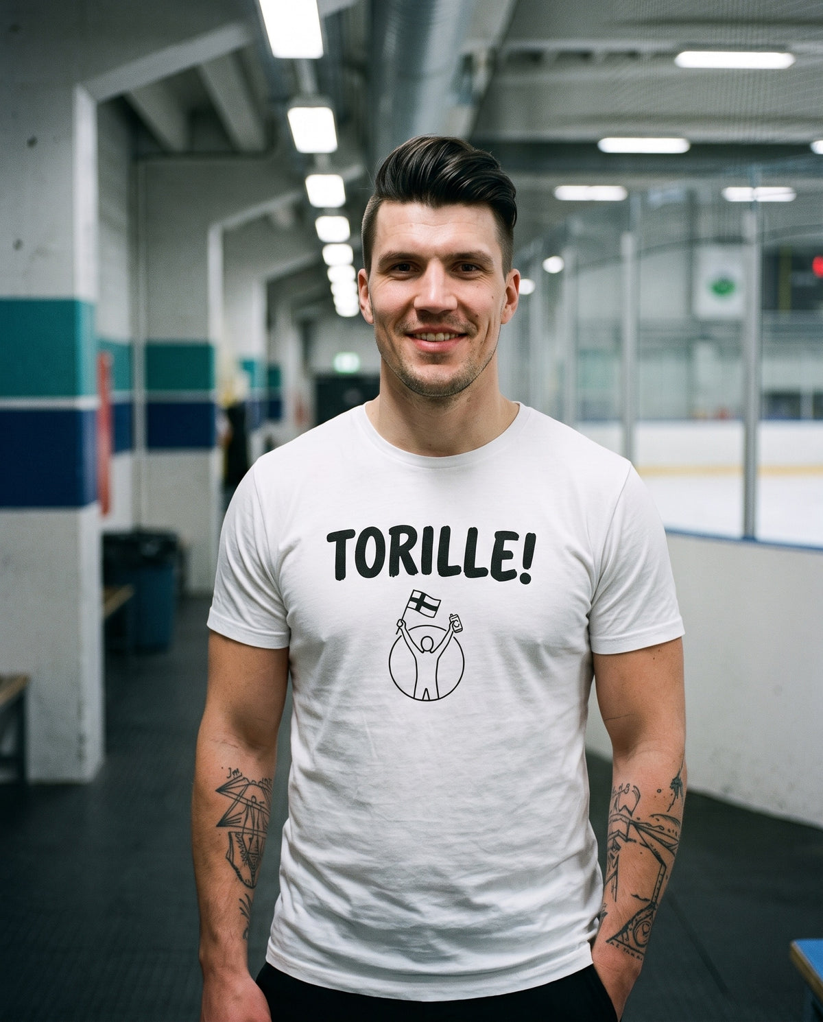 Torille t-shirt in white, worn by Eetu in the concourse of a Finnish ice hockey rink, Very Finnish Problems