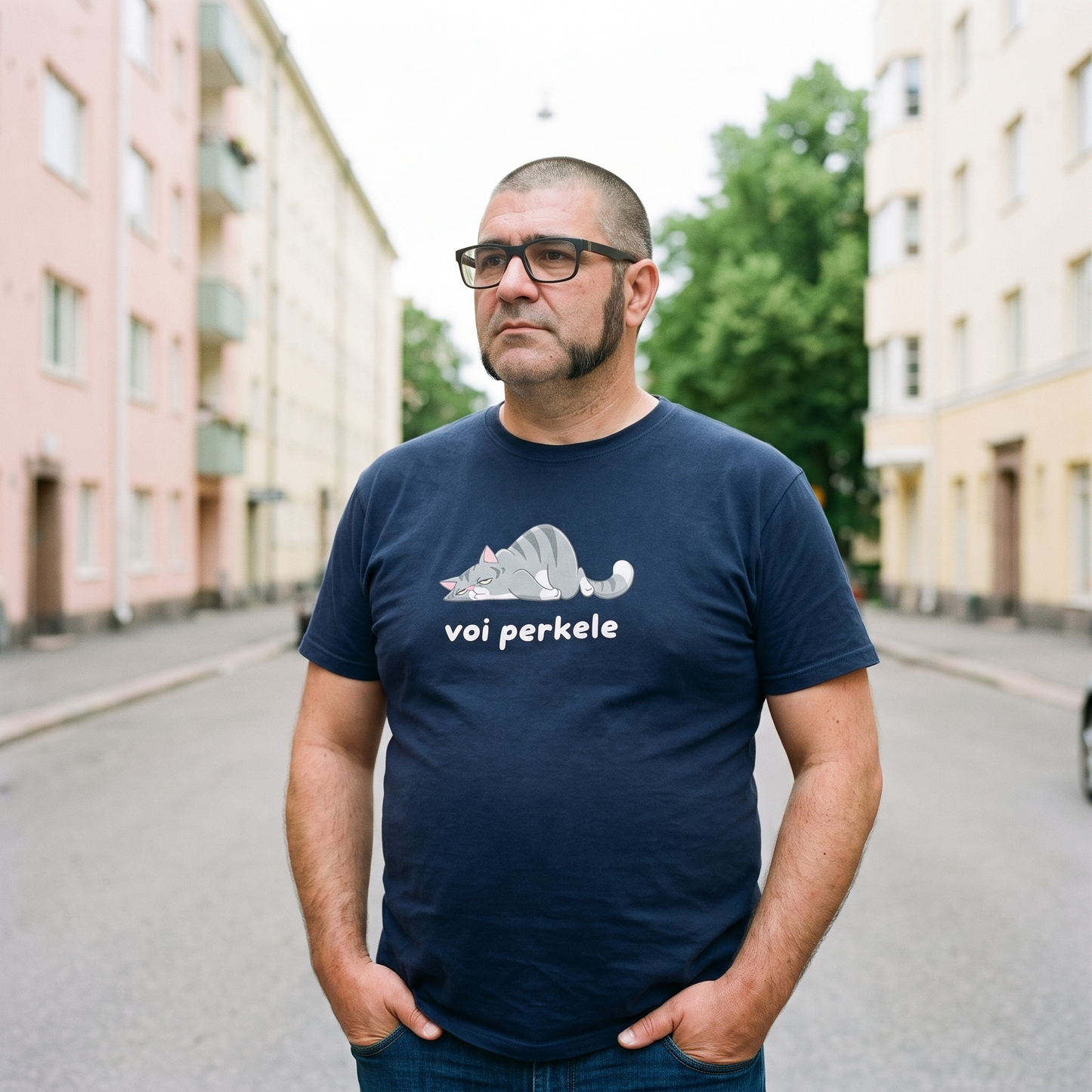 Voi perkele Cat t-shirt in navy, worn by Jaska on a Helsinki street, Very Finnish Problems