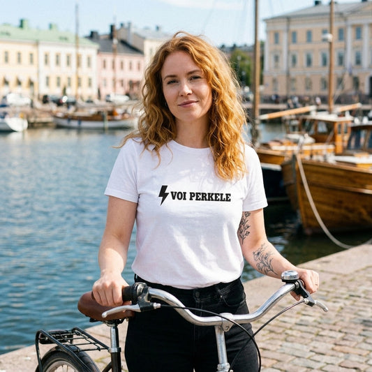 Voi perkele Finnish language t-shirt in white, worn with a bicycle at a Helsinki harbour, Very Finnish Problems