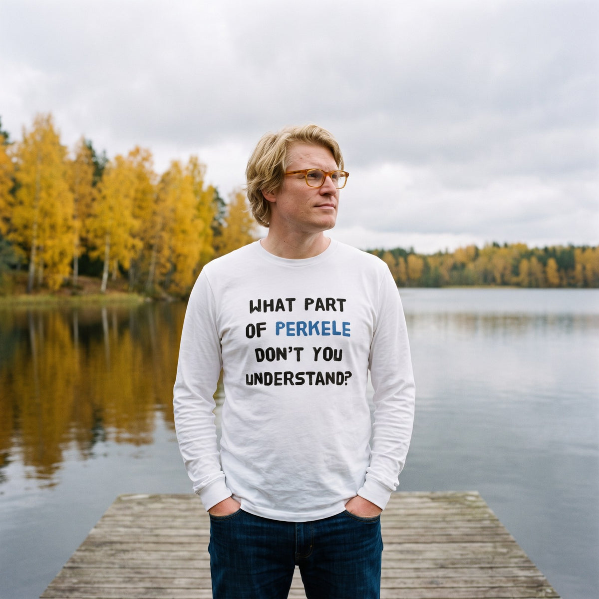 What Part of Perkele long sleeve tee in white, worn by Tuomas on a lake jetty, Very Finnish Problems