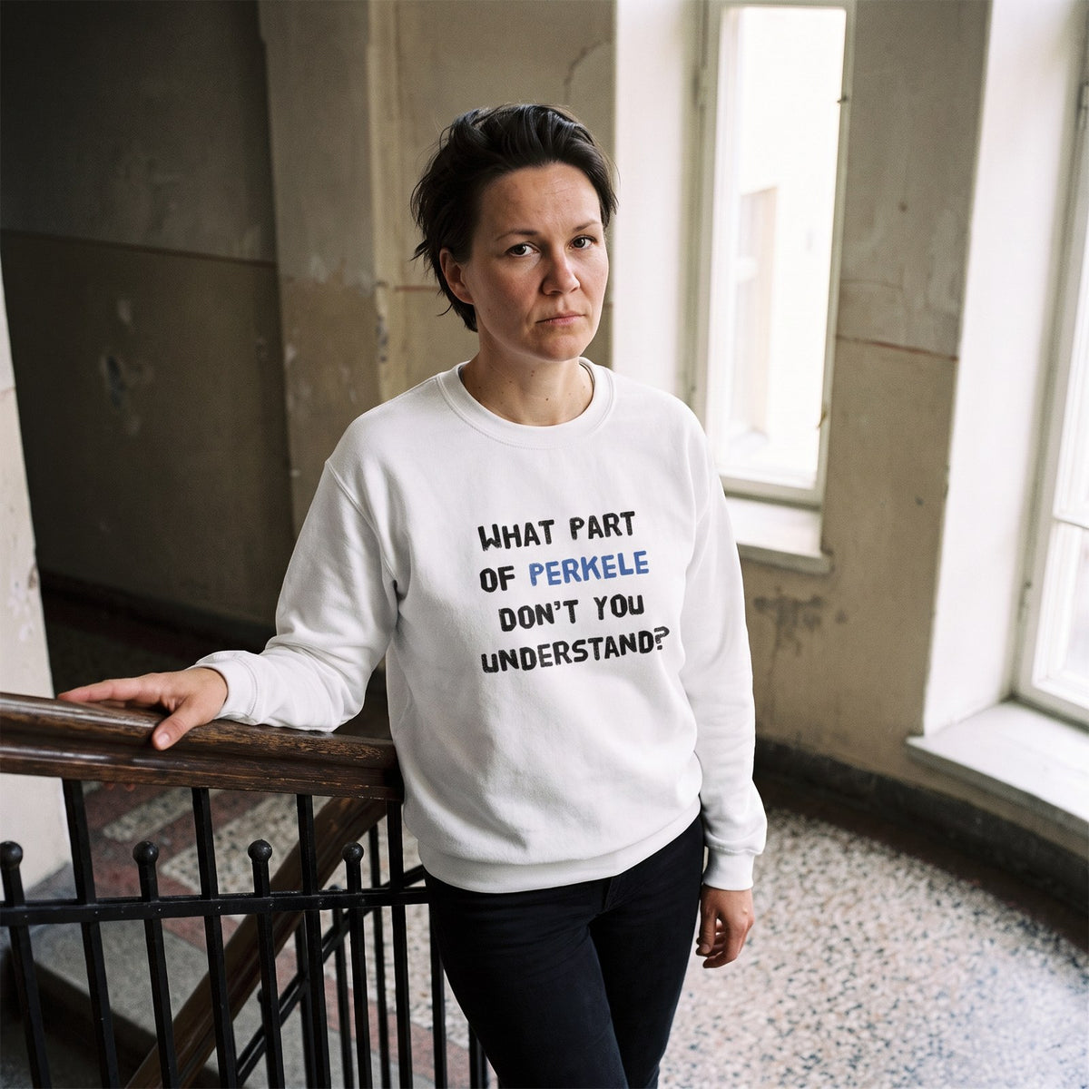 What Part of Perkele sweatshirt in white, worn by Katja in an old Helsinki stairwell, Very Finnish Problems