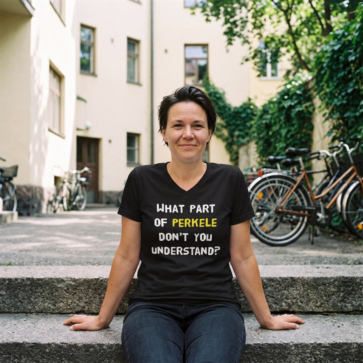 What Part of Perkele v-neck t-shirt, worn by Katja on Helsinki courtyard steps, Very Finnish Problems